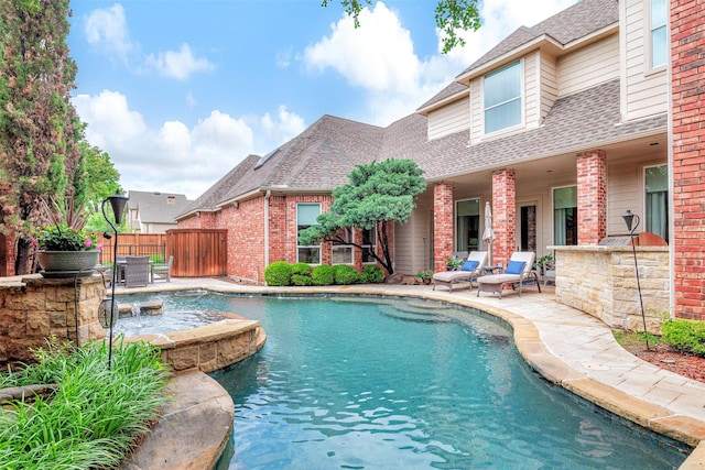 5861 Broadwell Dr, Plano, TX 75093 - view of pool with a patio, fence, and a pool with connected hot tub