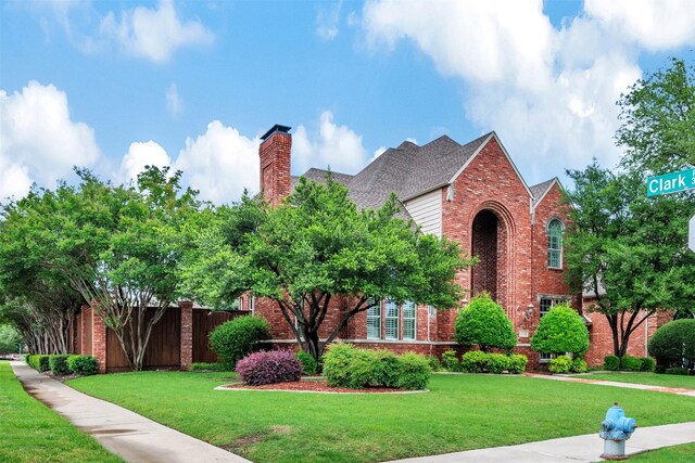 5861 Broadwell Dr, Plano, TX 75093 - view of front of property featuring brick siding and a chimney