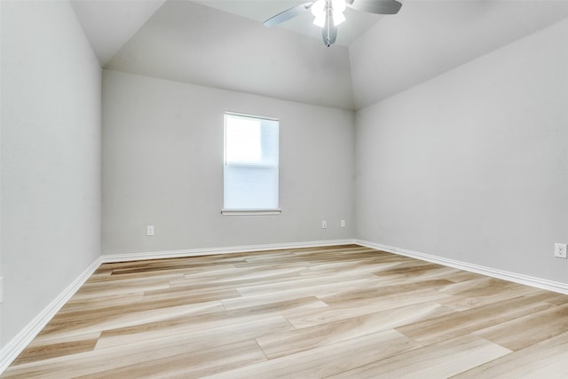 12523 Royal Oaks Ln, Farmers Branch, TX 75234 - empty room featuring light wood-style flooring, ceiling fan, lofted ceiling, and baseboards
