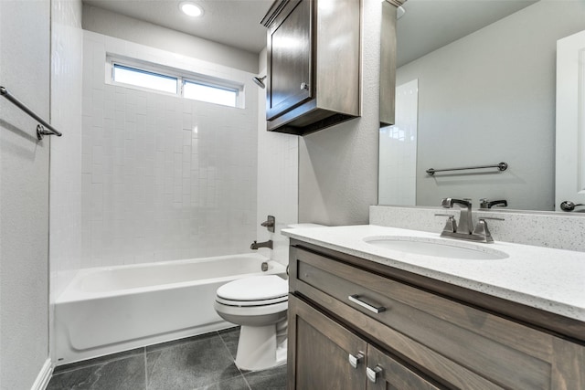 12523 Royal Oaks Ln, Farmers Branch, TX 75234 - bathroom with toilet, tub / shower combination, vanity, and a textured wall