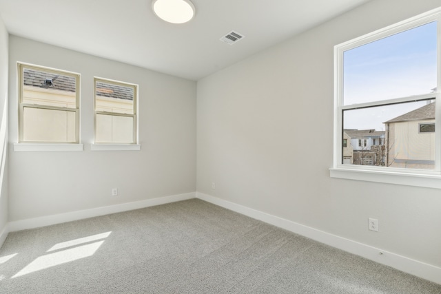 8289 Emsworth Dr, Dallas, TX 75231 - carpeted spare room with baseboards