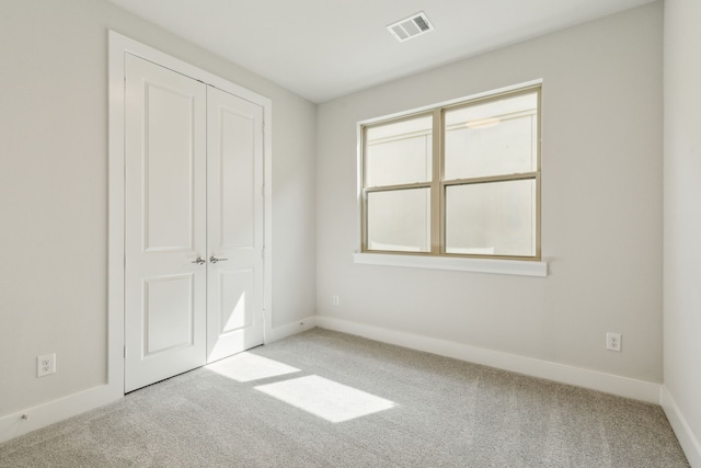 8289 Emsworth Dr, Dallas, TX 75231 - unfurnished bedroom featuring carpet flooring, baseboards, and a closet
