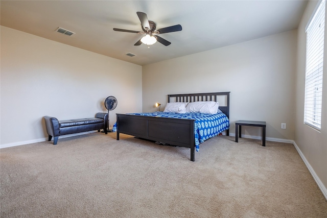 1431 Puerto Lago Dr, Little Elm, TX 75068 - bedroom with carpet floors, multiple windows, a ceiling fan, and baseboards