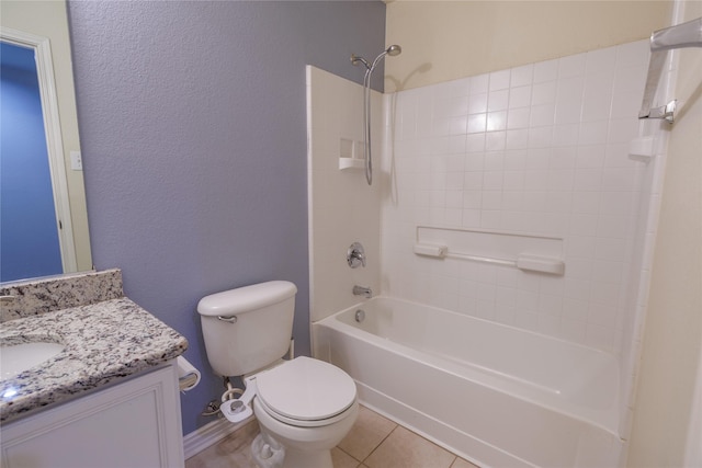 1431 Puerto Lago Dr, Little Elm, TX 75068 - bathroom featuring toilet, vanity, shower / bath combination, tile patterned floors, and a textured wall