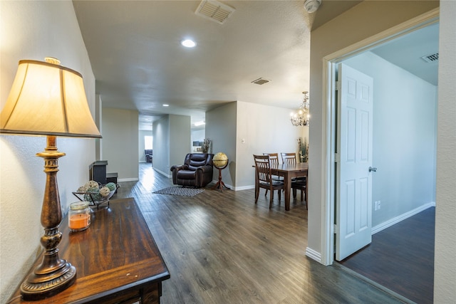 1431 Puerto Lago Dr, Little Elm, TX 75068 - living area featuring a chandelier, dark wood-type flooring, baseboards, and recessed lighting