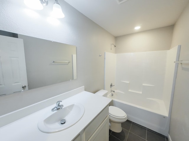 full bath featuring toilet, tile patterned floors, vanity, and shower / bath combination