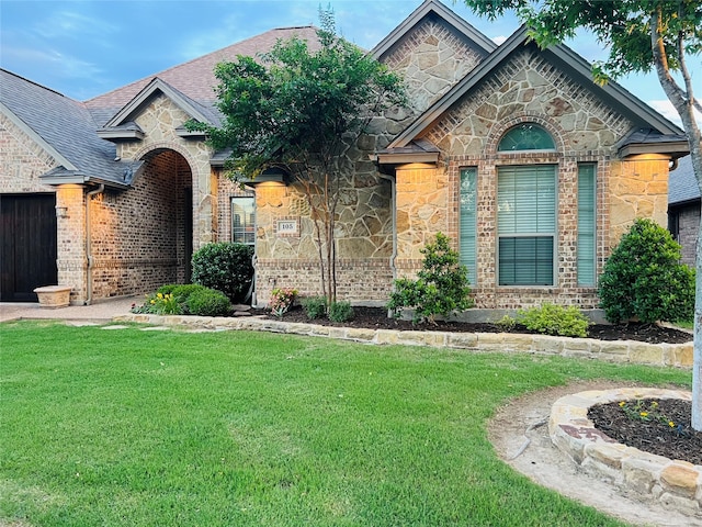 105 Troon Dr, Willow Park, TX 76008 - french provincial home featuring stone siding, a front lawn, and brick siding