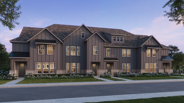 2825 Chisos Red Rd, Mckinney, TX 75071 - view of front of home with board and batten siding, a standing seam roof, and metal roof