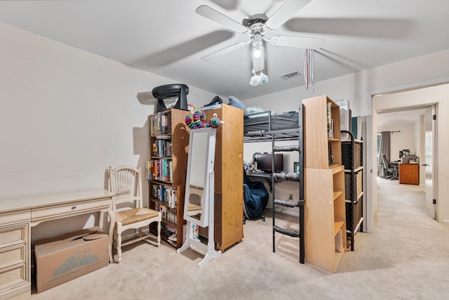 bedroom with carpet floors, a desk, and ceiling fan