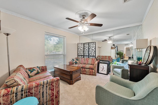 living room featuring ceiling fan, light carpet, and crown molding