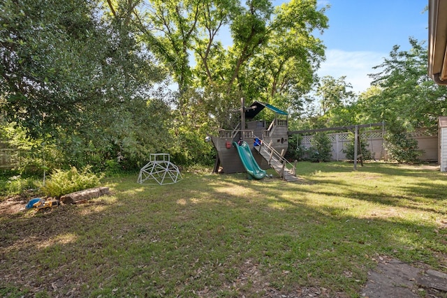 view of yard with a playground