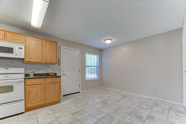 3817 Roman Ct, Plano, TX 75023 - kitchen featuring white appliances, a textured ceiling, dark countertops, light marble finish floors, and baseboards