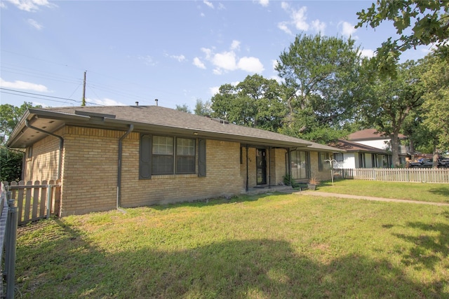 1524 Daywood Ln, Irving, TX 75061 - view of front facade featuring brick siding and roof with shingles