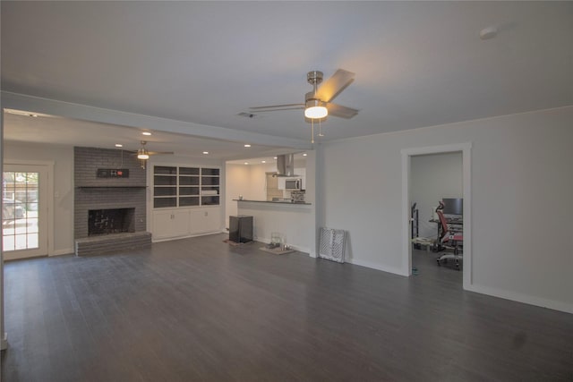 1524 Daywood Ln, Irving, TX 75061 - living room with dark wood-type flooring, a ceiling fan, baseboards, a fireplace, and recessed lighting