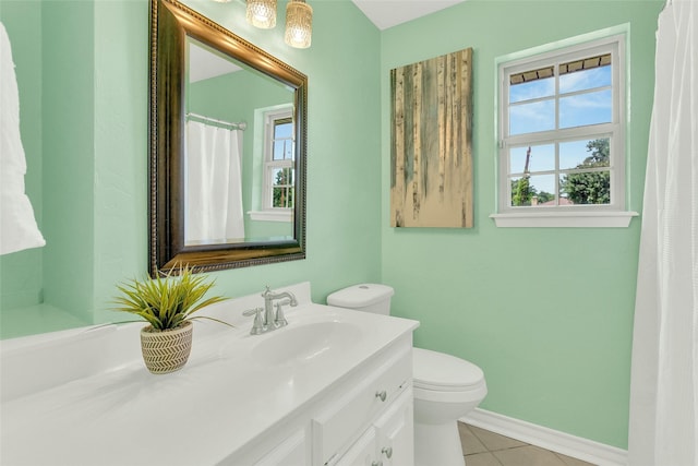 8811 Pheasant Dr, Chandler, TX 75758 - full bath featuring baseboards, tile patterned flooring, vanity, and toilet