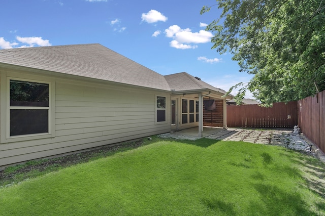 409 Bird Creek Dr, Little Elm, TX 75068 - back of property with a patio area and a shingled roof
