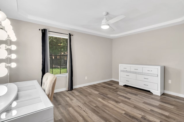 7108 Bermuda Ct, North Richland Hills, TX 76180 - unfurnished office with healthy amount of natural light, wood finished floors, ceiling fan, and baseboards