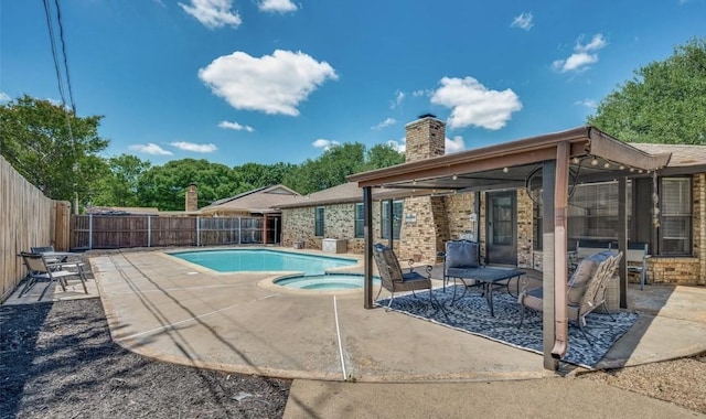 7108 Bermuda Ct, North Richland Hills, TX 76180 - view of swimming pool with a patio area, a fenced backyard, and a pool with connected hot tub
