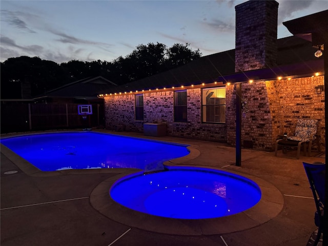 7108 Bermuda Ct, North Richland Hills, TX 76180 - view of swimming pool featuring a patio and a pool with connected hot tub