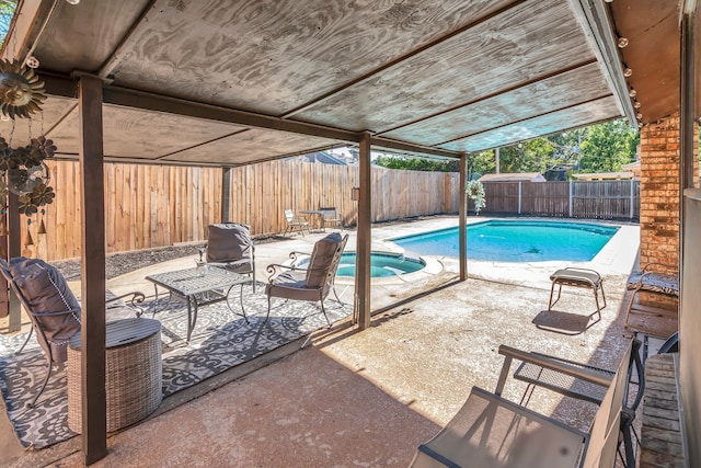 7108 Bermuda Ct, North Richland Hills, TX 76180 - view of pool featuring a patio area, a fenced backyard, and a pool with connected hot tub