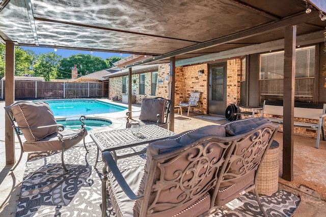 7108 Bermuda Ct, North Richland Hills, TX 76180 - fenced backyard with an in-ground hot tub and a patio