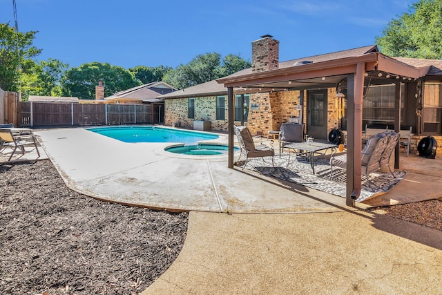 7108 Bermuda Ct, North Richland Hills, TX 76180 - view of pool with a patio and a pool with connected hot tub
