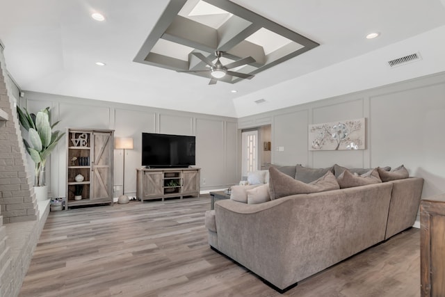 7108 Bermuda Ct, North Richland Hills, TX 76180 - living area with a decorative wall, a skylight, light wood-style flooring, a ceiling fan, and recessed lighting