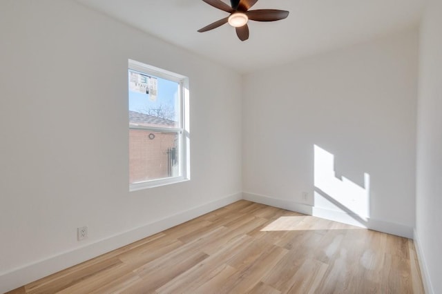 1902 San Antonio St, Grand Prairie, TX 75051 - spare room featuring ceiling fan, light wood-type flooring, and baseboards