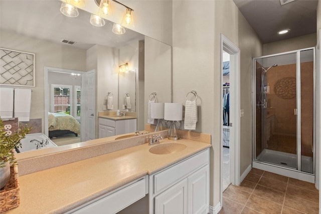 1704 Landon Ln, Mckinney, TX 75071 - ensuite bathroom featuring a shower stall, tile patterned floors, and vanity