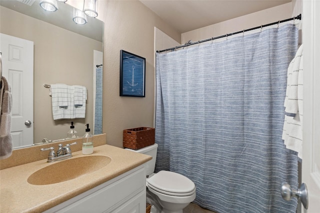1704 Landon Ln, Mckinney, TX 75071 - full bathroom featuring toilet, vanity, a textured wall, and curtained shower