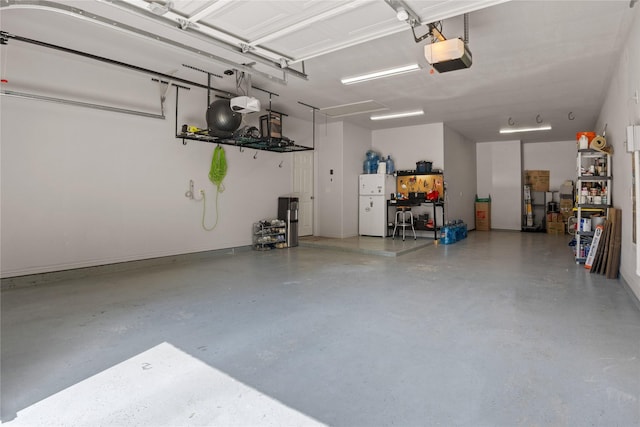 1704 Landon Ln, Mckinney, TX 75071 - garage featuring a garage door opener