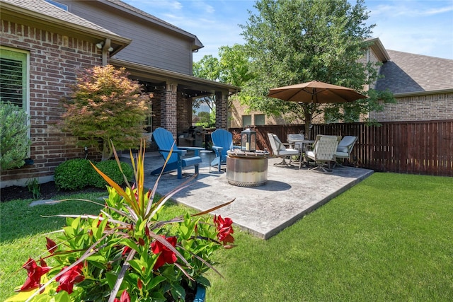 1704 Landon Ln, Mckinney, TX 75071 - view of patio featuring an outdoor fire pit