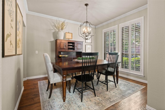 1704 Landon Ln, Mckinney, TX 75071 - dining space featuring plenty of natural light, a chandelier, baseboards, dark wood-style flooring, and ornamental molding