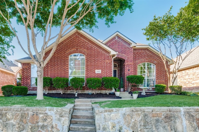 1699 Garrison Dr, Frisco, TX 75033 - view of front of house with brick siding and a front yard