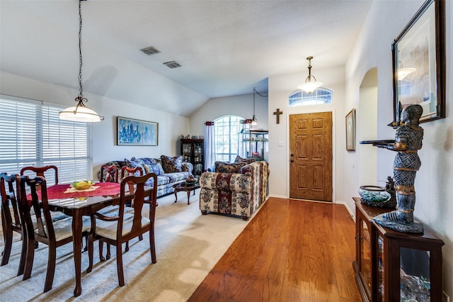 1699 Garrison Dr, Frisco, TX 75033 - dining area featuring vaulted ceiling and arched walkways