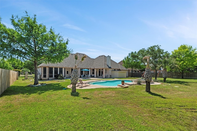 811 Shady Bend Dr, Kennedale, TX 76060 - rear view of house with a patio, an attached garage, and a sunroom
