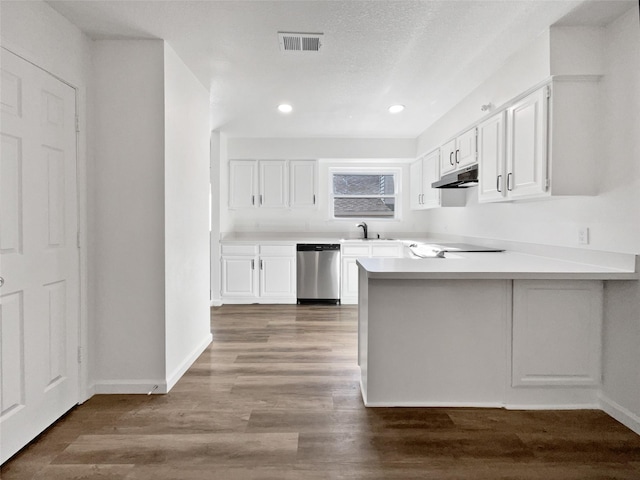 5205 Foley Dr, Arlington, TX 76013 - kitchen featuring dishwasher, white cabinets, a peninsula, a sink, and recessed lighting