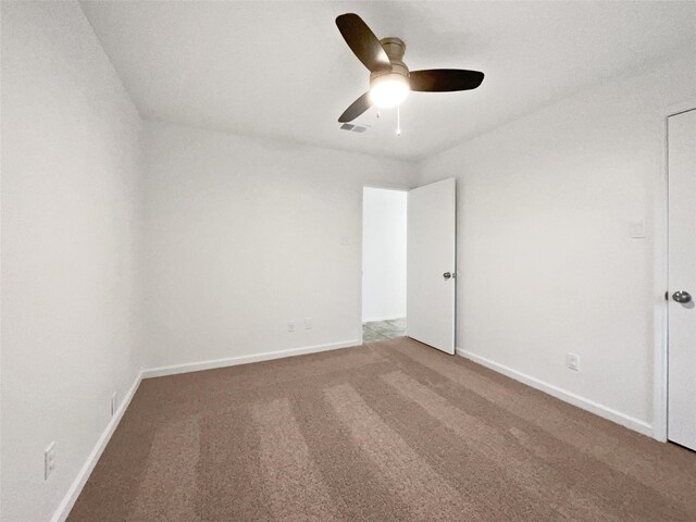 5205 Foley Dr, Arlington, TX 76013 - unfurnished bedroom with carpet flooring, baseboards, and ceiling fan