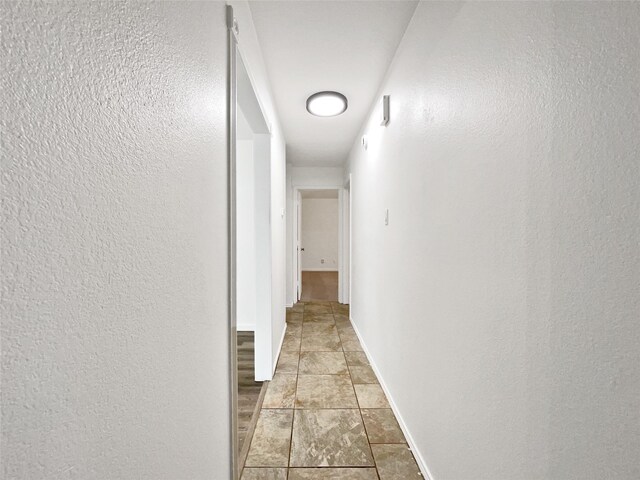 5205 Foley Dr, Arlington, TX 76013 - hall with baseboards and a textured wall