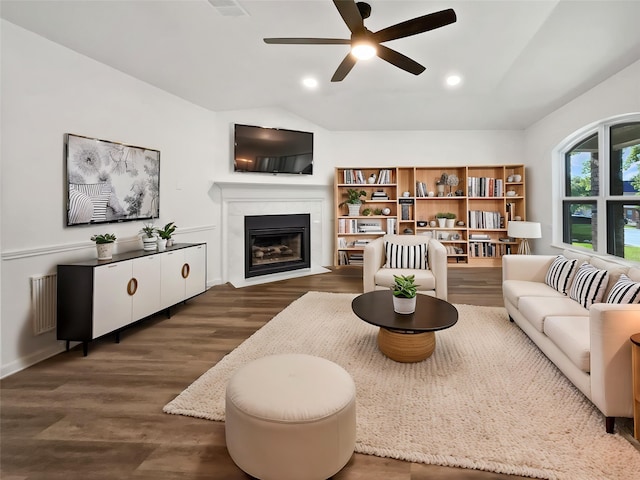 5205 Foley Dr, Arlington, TX 76013 - living room featuring ceiling fan, dark wood-type flooring, a fireplace with flush hearth, recessed lighting, and baseboards