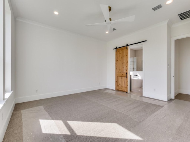 1045 Bent Tree Ln, Gunter, TX 75058 - unfurnished bedroom with carpet floors, ornamental molding, recessed lighting, a barn door, and baseboards