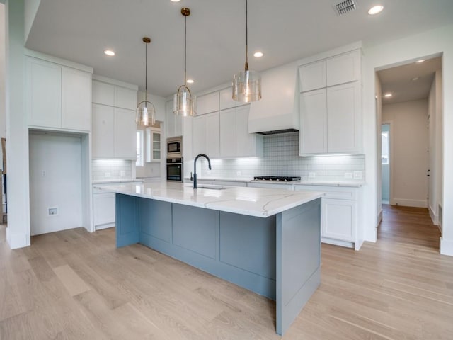 1045 Bent Tree Ln, Gunter, TX 75058 - kitchen featuring a sink, stainless steel appliances, custom range hood, white cabinets, and recessed lighting