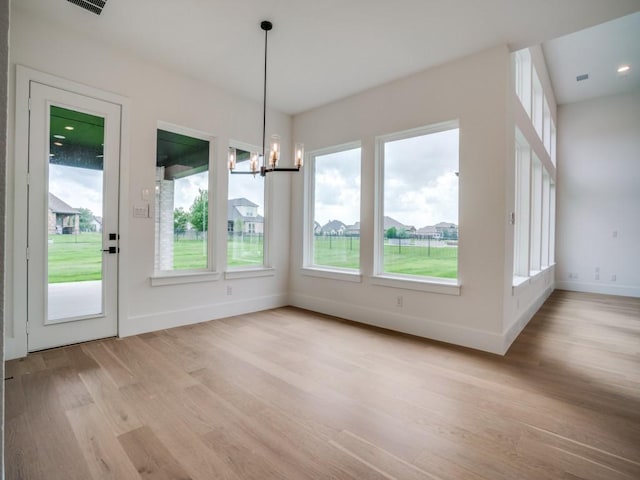 1045 Bent Tree Ln, Gunter, TX 75058 - unfurnished sunroom with plenty of natural light and a chandelier