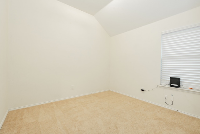 127 Wandering Dr, Forney, TX 75126 - carpeted empty room featuring vaulted ceiling and baseboards