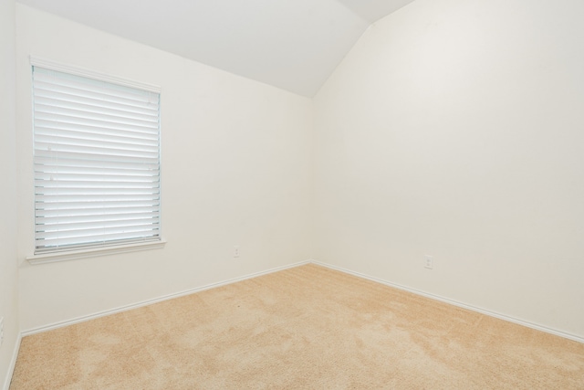 127 Wandering Dr, Forney, TX 75126 - carpeted spare room with lofted ceiling and baseboards