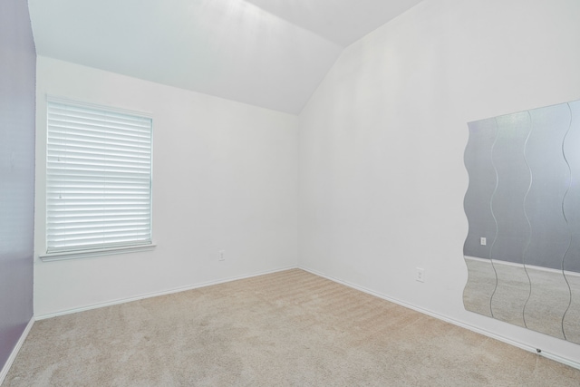 127 Wandering Dr, Forney, TX 75126 - carpeted empty room featuring vaulted ceiling and baseboards