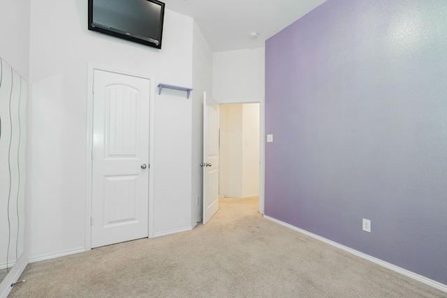 127 Wandering Dr, Forney, TX 75126 - unfurnished bedroom featuring carpet flooring and baseboards