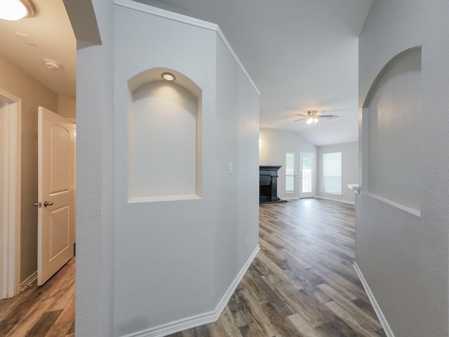 204 Spring Hollow Dr, Saginaw, TX 76131 - hall featuring wood finished floors, lofted ceiling, and baseboards