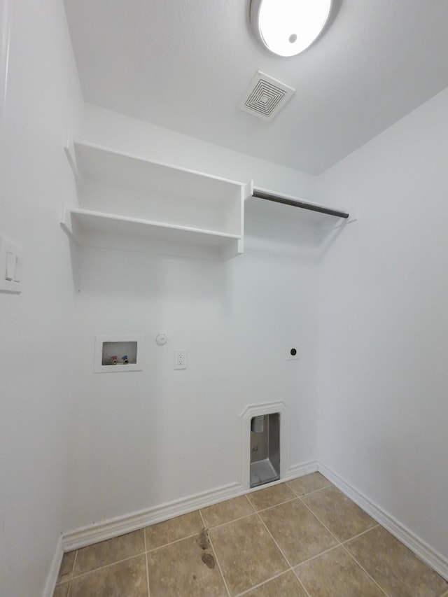 204 Spring Hollow Dr, Saginaw, TX 76131 - laundry area with hookup for a gas dryer, washer hookup, hookup for an electric dryer, and tile patterned floors