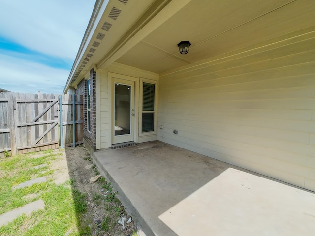 204 Spring Hollow Dr, Saginaw, TX 76131 - view of patio / terrace featuring fence and a gate